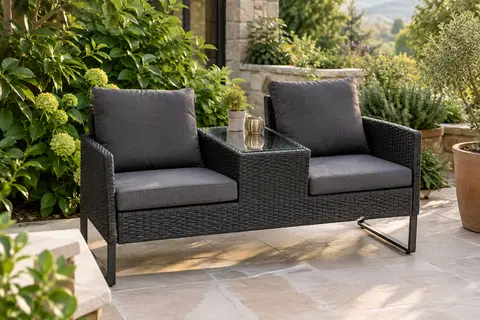 Banquette de jardin en polyrotin noir avec coussins gris foncé et table intégrée en verre