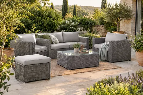 Salon de jardin modulable gris en polyrotin avec coussins, pouf et table basse à plaque de verre