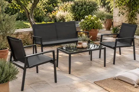 Salon de jardin noir avec banquette, deux chaises en textilène et table basse à plateau en verre